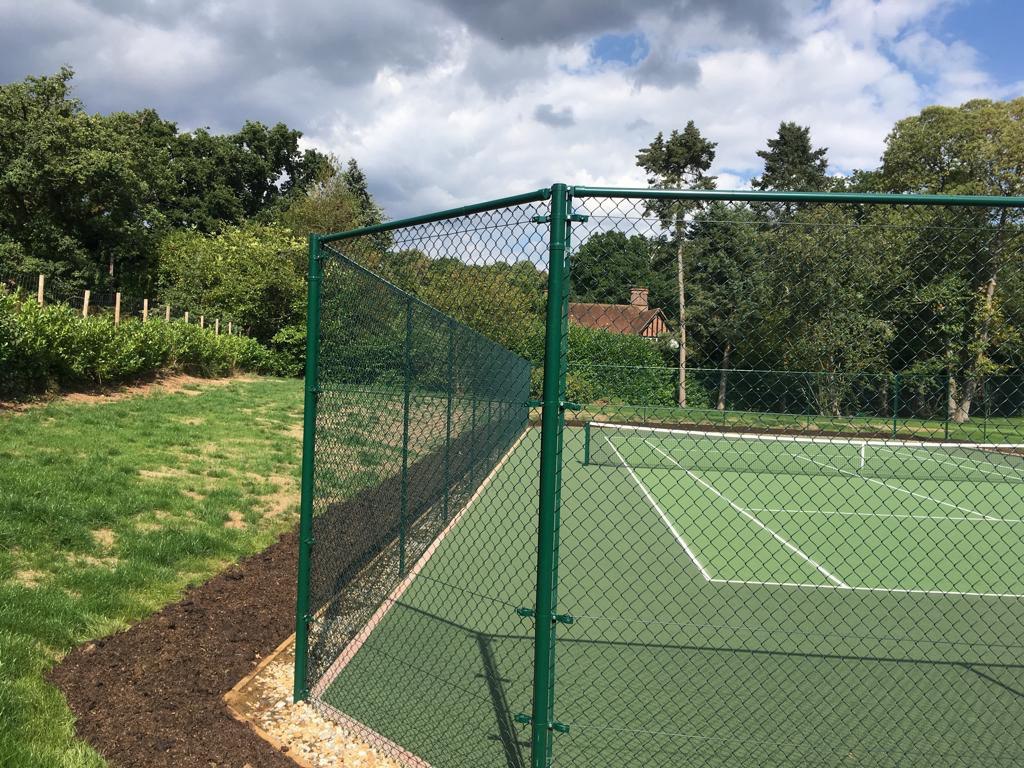 This is a photo of a new tennis court fence installed in Dorset, All works carried out by Tennis Court Construction Dorset