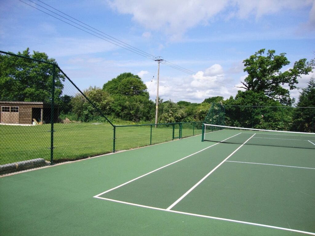 This is a photo of a new tennis court installed in Dorset, All works carried out by Tennis Court Construction Dorset