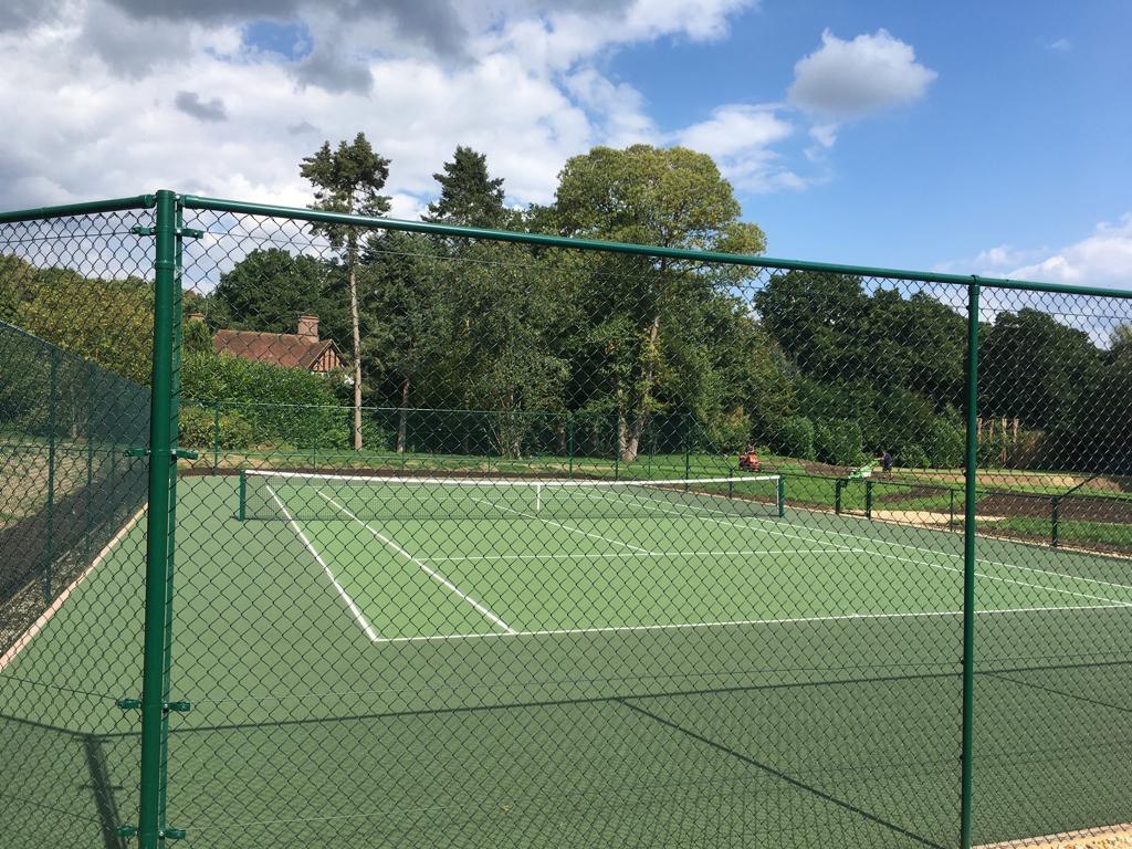 This is a photo of a new tennis court installed in Dorset, All works carried out by Tennis Court Construction Dorset